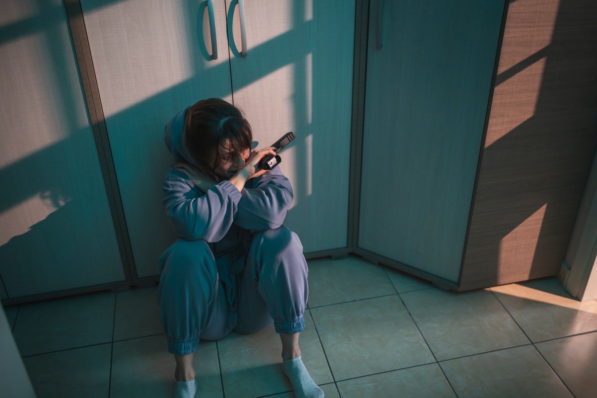 Suicidal woman holding a gun